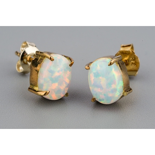 56 - 9 ct gold set opal earrings, gross weight 1.5g