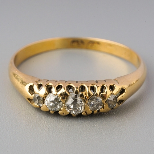 62 - 18ct gold three stone ring, gross weight 2.1g , UK size N1/2