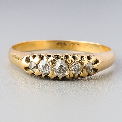 62 - 18ct gold three stone ring, gross weight 2.1g , UK size N1/2