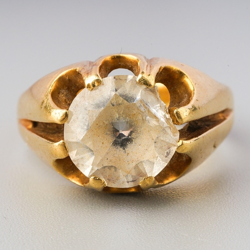 73 - A gem set single stone ring, set with a circular-shape mixed cut rock crystal, within an extended ei... 