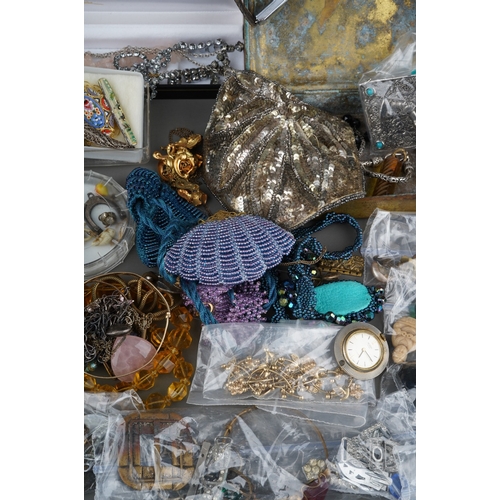 79 - Large collection of costume jewellery to include  silver chain, silver shell pendant, coral necklace... 