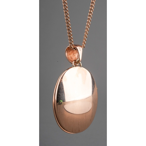 83 - 9ct rose gold chain and locket, etched front detail. Locket measures 31 mm x 23 mm. Gross weight 17.... 