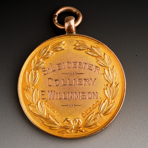 84 - A George V 9ct gold medal for Derbyshire Challenge Cup 1932, awarded to S Leicester Colliery E Willi... 