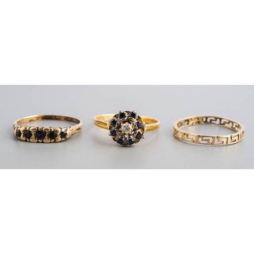 97 - A selection of three rings, to include a an 18ct gold diamond and sapphire cluster ring, hallmarked ... 