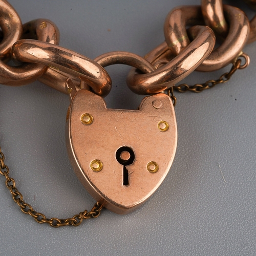 105 - A 9ct gold padlock link bracelet 21.4grams