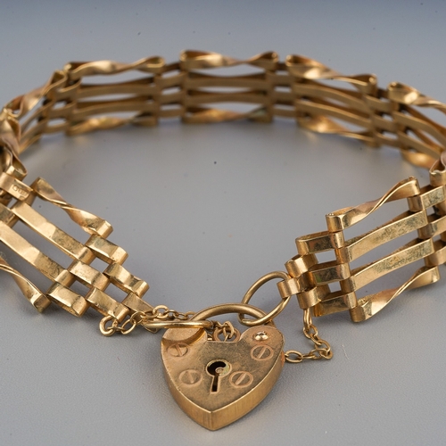 108 - 9 ct gold bracelet with heart shaped lock, 9.5g