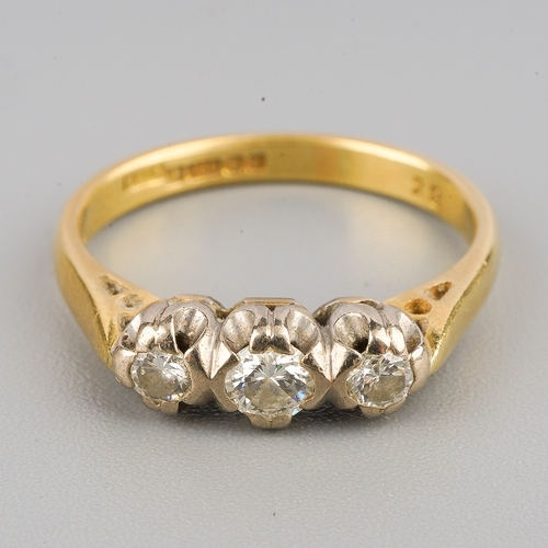 110 - An 18ct gold diamond three-stone ring, set with graduating round brilliant cut diamonds, claw set, t... 