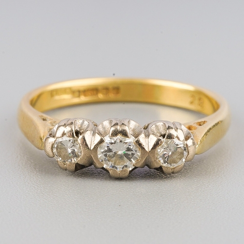 110 - An 18ct gold diamond three-stone ring, set with graduating round brilliant cut diamonds, claw set, t... 