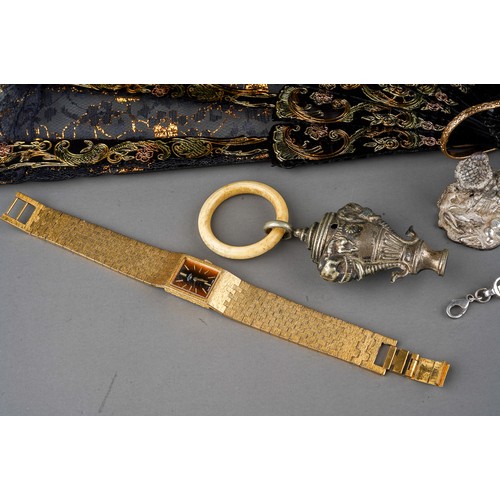 112 - A small collection of silver, costume jewellery and collectables, including a white metal baby's rat... 