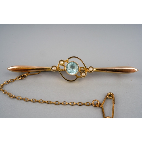 115 - 9ct gold pendant and brooch set with aquamarine and seed pearls and a plated chain. Gross weight wit... 