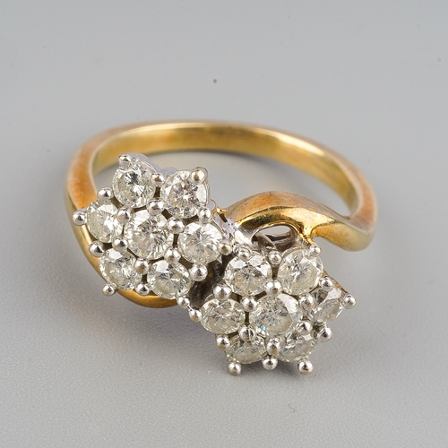 122 - A 9ct gold diamond double cluster ring, set with round brilliant cut diamonds, estimated total diamo... 