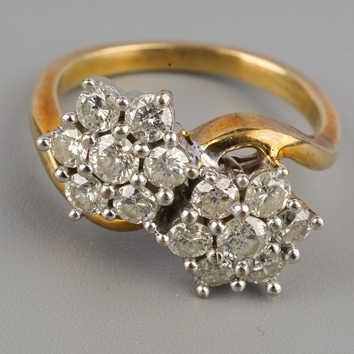 122 - A 9ct gold diamond double cluster ring, set with round brilliant cut diamonds, estimated total diamo... 