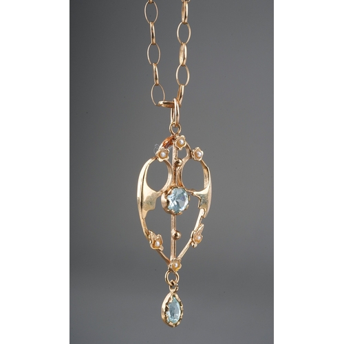 125 - 9 ct gold pendant set with pale blue stones and seed pearls on a 9 ct gold long chain, gross weight ... 