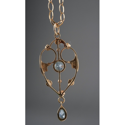 125 - 9 ct gold pendant set with pale blue stones and seed pearls on a 9 ct gold long chain, gross weight ... 