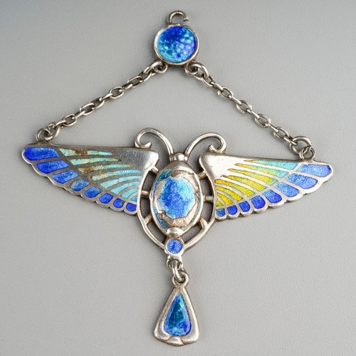 127 - Charles Horner: an Art Nouveau Egyptian Revival silver and polychrome enamel winged scarab pendant w... 