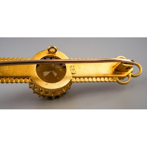 137 - 15 ct and citrine set brooch, gross weight 4.2 g