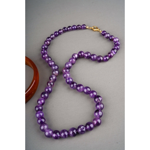 145 - Solid agate bangle, amethyst necklace and 2 further green glass ( possibly malachite) necklaces