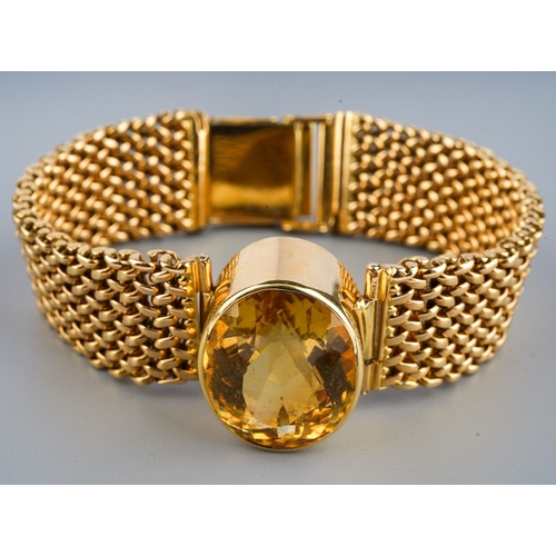 147 - Yellow metal bracelet set with large citrine to centre. Unmarked but tests high carat. Gross weight ... 