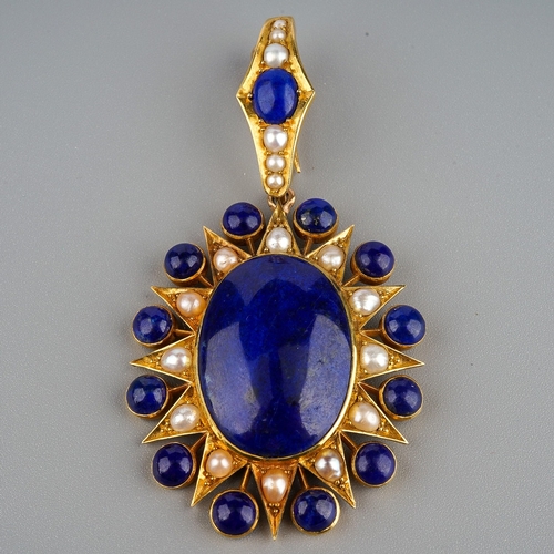 149 - A lapis lazuli and pearl pendant, late 19th century, designed as a cabochon of lapis lazuli within a... 