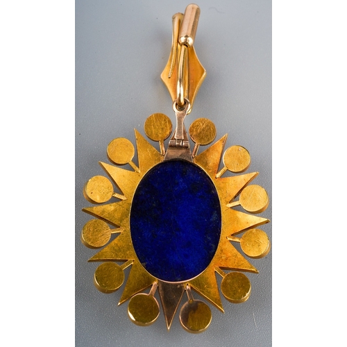 149 - A lapis lazuli and pearl pendant, late 19th century, designed as a cabochon of lapis lazuli within a... 