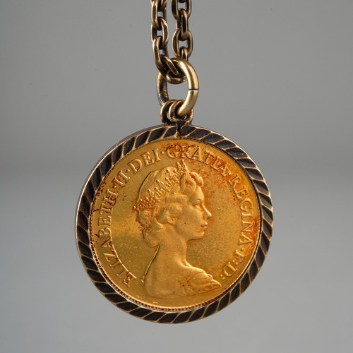 155 - 1980 half sovereign  in mounts on a chain