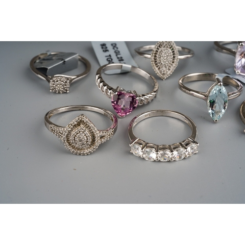 168 - 9 hallmarked silver gem set rings