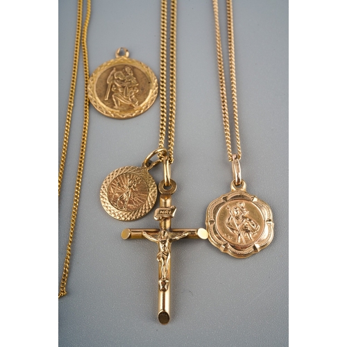 173 - Three fine 9ct gold chains and crucifix and three St Christophers pendants. Gross weight 11.5g