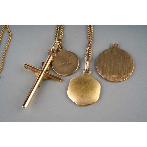 173 - Three fine 9ct gold chains and crucifix and three St Christophers pendants. Gross weight 11.5g