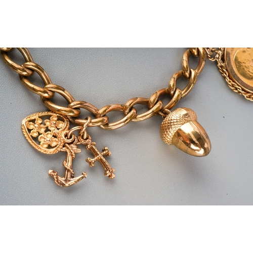 175 - ***Please note change of description*** 9ct gold plated charm bracelet inclusive of half sovereign m... 