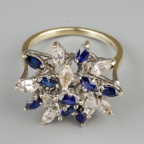 196 - A 9ct white gold gem set ring, set with synthetic blue sapphire and colourless spinel, to the plain ... 