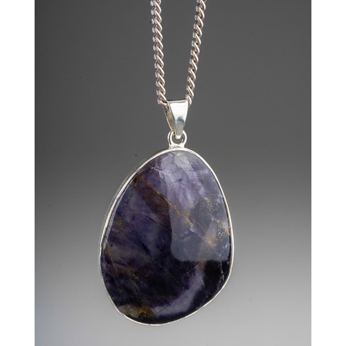 200 - A large silver mounted blue john pendant on silver chain. Stone measures approx. 4 x 3 cm