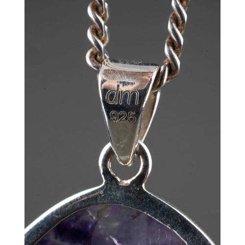 200 - A large silver mounted blue john pendant on silver chain. Stone measures approx. 4 x 3 cm