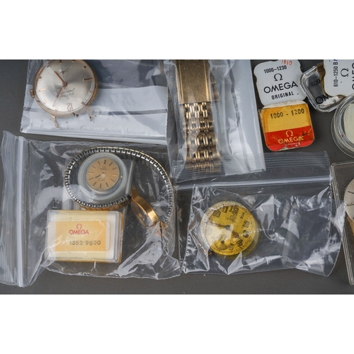 238 - Collection of assorted Omega and Rolex watch parts including movements , replacement parts, dials, g... 