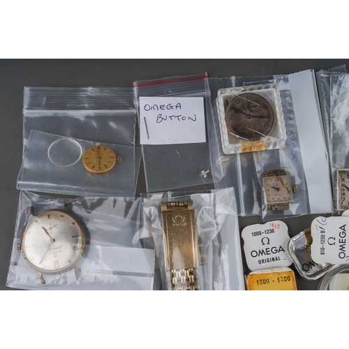 238 - Collection of assorted Omega and Rolex watch parts including movements , replacement parts, dials, g... 