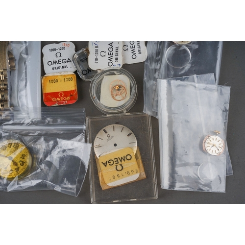 238 - Collection of assorted Omega and Rolex watch parts including movements , replacement parts, dials, g... 