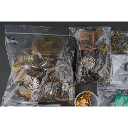 241 - Large collection of watch parts, movements and faces ( 1 bag)