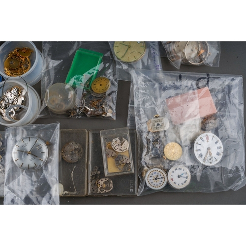 241 - Large collection of watch parts, movements and faces ( 1 bag)