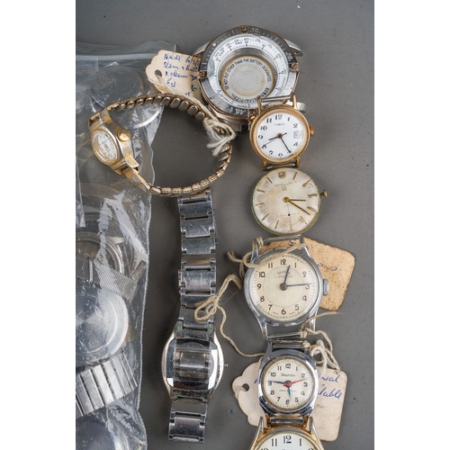 242 - Large collection of watch parts, faces, movements ( 1 box)