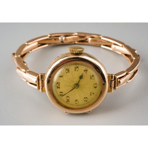 248 - 9ct gold ladies wrist watch. Gross weight 19.5g. Movement marked Texina