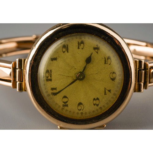 248 - 9ct gold ladies wrist watch. Gross weight 19.5g. Movement marked Texina