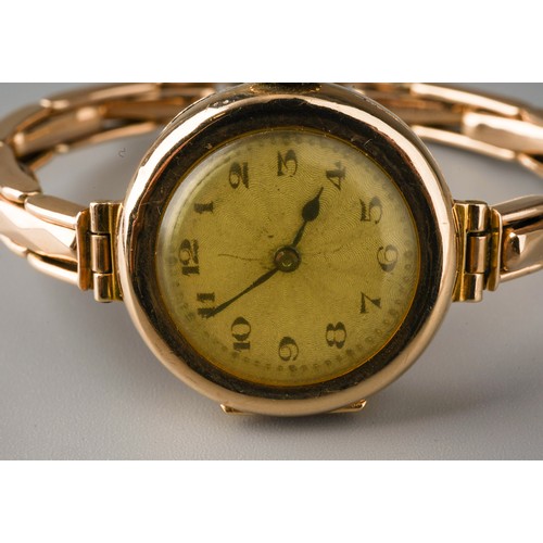 248 - 9ct gold ladies wrist watch. Gross weight 19.5g. Movement marked Texina