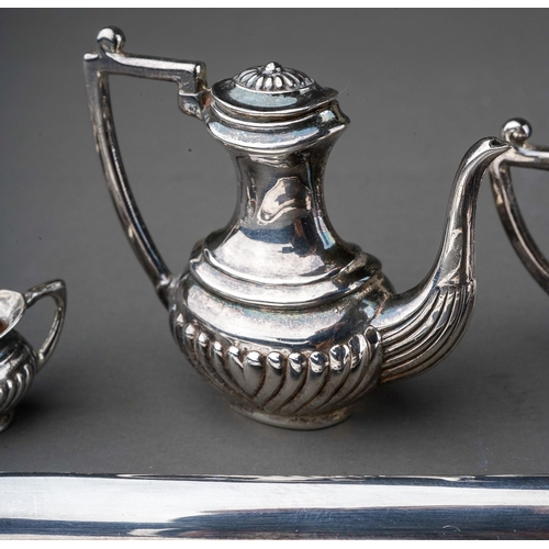 256 - An Elizabeth II silver miniature four piece Georgian style tea and coffee service on twin handled tr... 