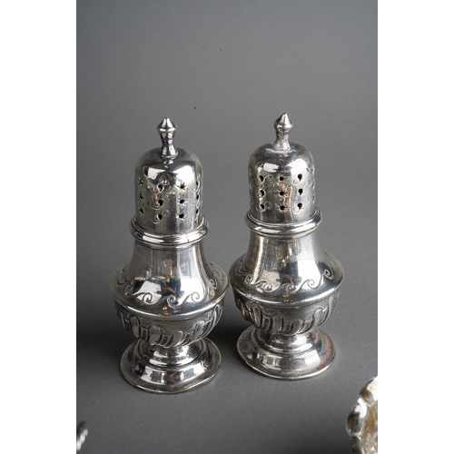 258 - A parcel of ten assorted silver cruet items, comprising a pair of late Victorian baluster pepperette... 