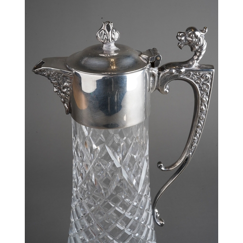 260 - An Elizabeth II silver mounted cut glass claret jug, with mask spout and beast head thumb piece abov... 