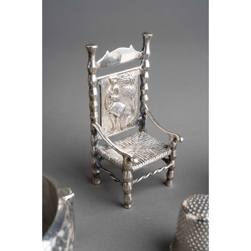 263 - A collection of small silver, white metal and plated items, comprising a miniature German white meta... 