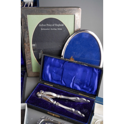 264 - A small group of hallmarked silver and a parcel of cased and loose plated cutlery and hollow ware, e... 