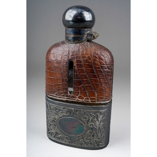 274 - An early 20th Century glass spirit flask, with silver plate cover and detachable engraved cup, the u... 