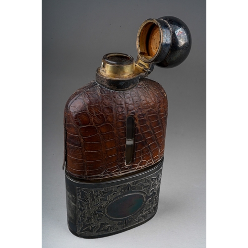 274 - An early 20th Century glass spirit flask, with silver plate cover and detachable engraved cup, the u... 