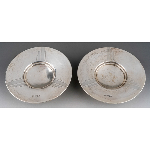 281 - A pair of Art Deco style circular bon bon dishes, engraved decoration, recessed centres, hallmarked ... 