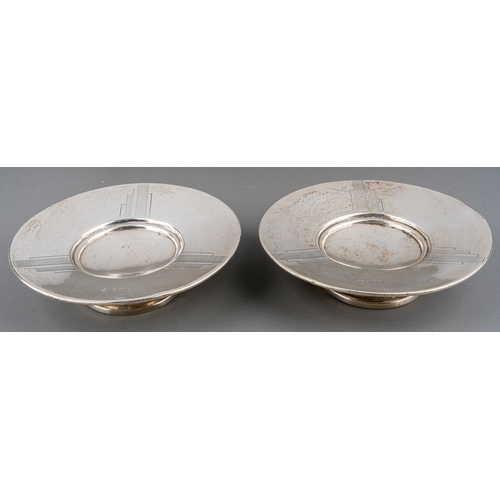 281 - A pair of Art Deco style circular bon bon dishes, engraved decoration, recessed centres, hallmarked ... 